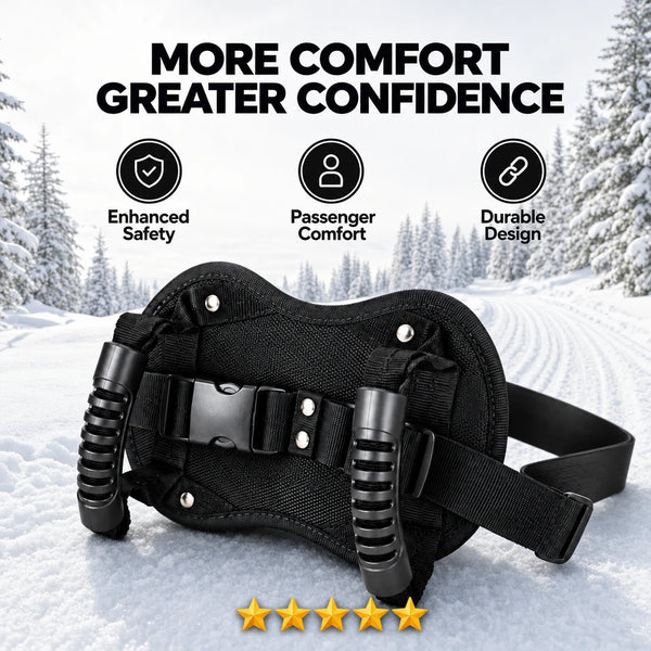 SledGrip safety belt worn by a snowmobile driver on a snowy trail.